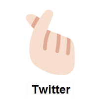 Hand with Index Finger and Thumb Crossed: Light Skin Tone on Twitter Twemoji