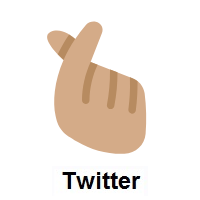Hand with Index Finger and Thumb Crossed: Medium Skin Tone on Twitter Twemoji