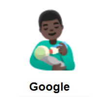 Man Feeding Baby: Dark Skin Tone on Google Android