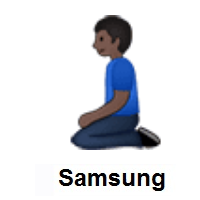 Man Kneeling: Dark Skin Tone on Samsung
