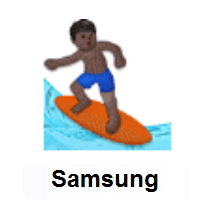 Man Surfing: Dark Skin Tone on Samsung
