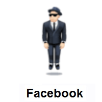 Person in Suit Levitating: Light Skin Tone on Facebook