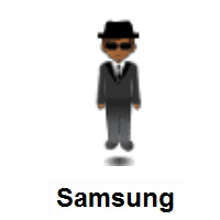 Person in Suit Levitating: Medium-Dark Skin Tone on Samsung