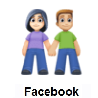 Woman and Man Holding Hands: Light Skin Tone, Medium-Light Skin Tone on Facebook