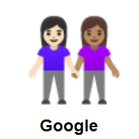 Women Holding Hands: Light Skin Tone, Medium Skin Tone on Google Android